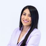 Erika Santiago, Head of Corporate Affairs, Social Impact and Communications profile photo