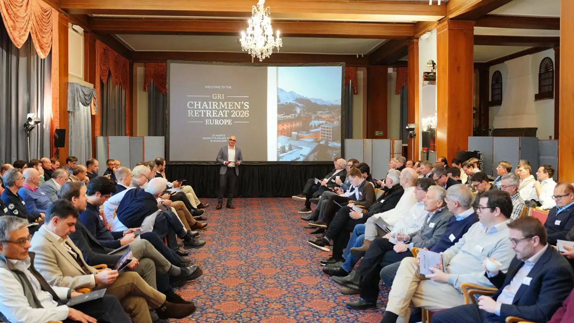 A large room full of senior real estate leaders discussing industry topics at the GRI Chairmen's Retreat Europe 2026