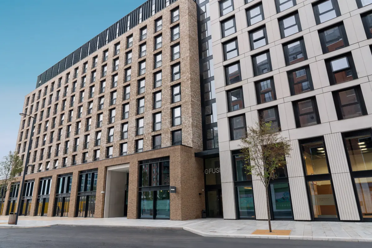 A luxurious marble bathroom in the Orient Express La Minerva, featuring a deep soaking tub, ornate fixtures, and classic design details.