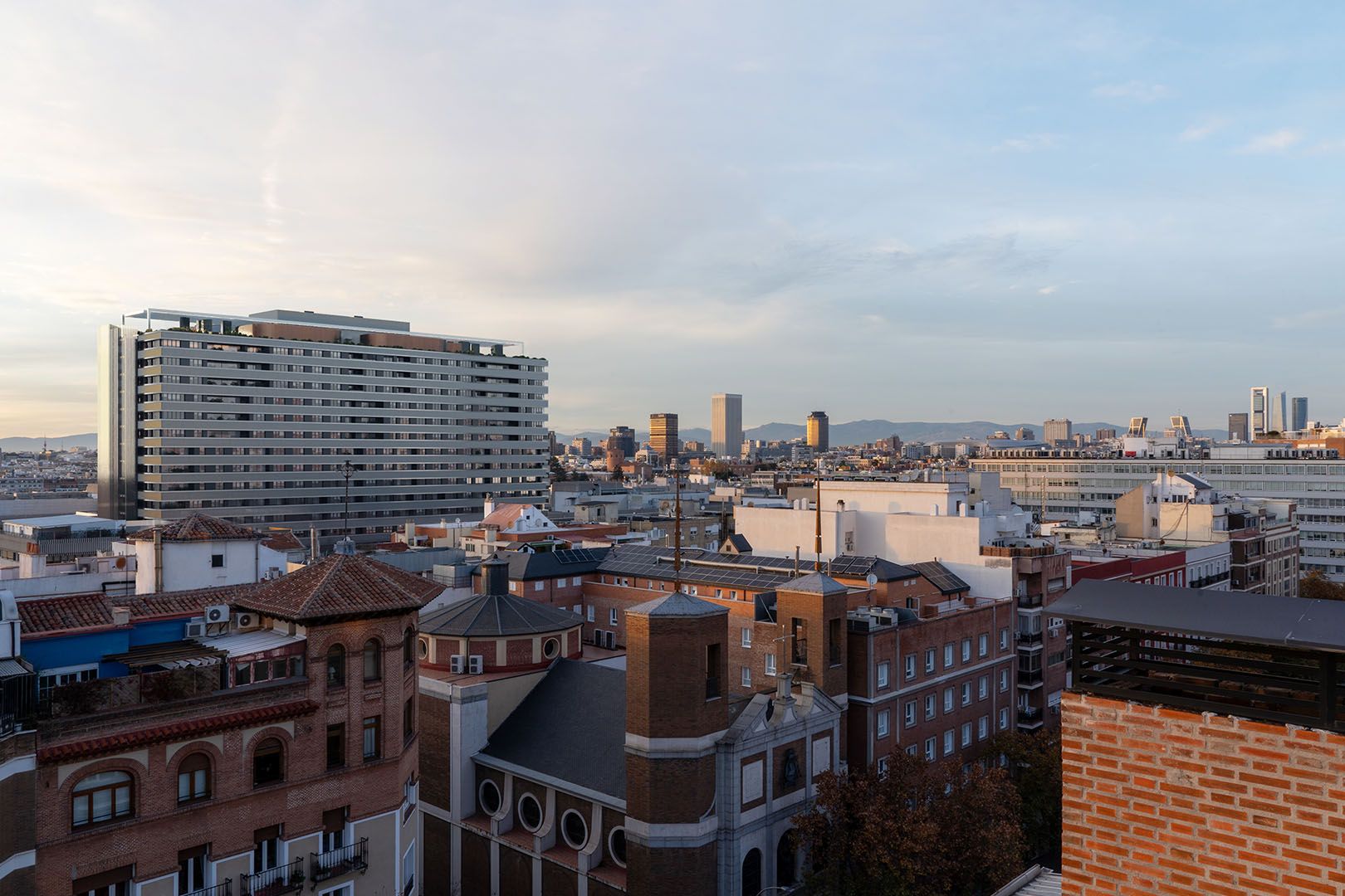 A luxurious guest room in the Orient Express La Minerva, featuring a plush bed with rich textiles and classic decor.