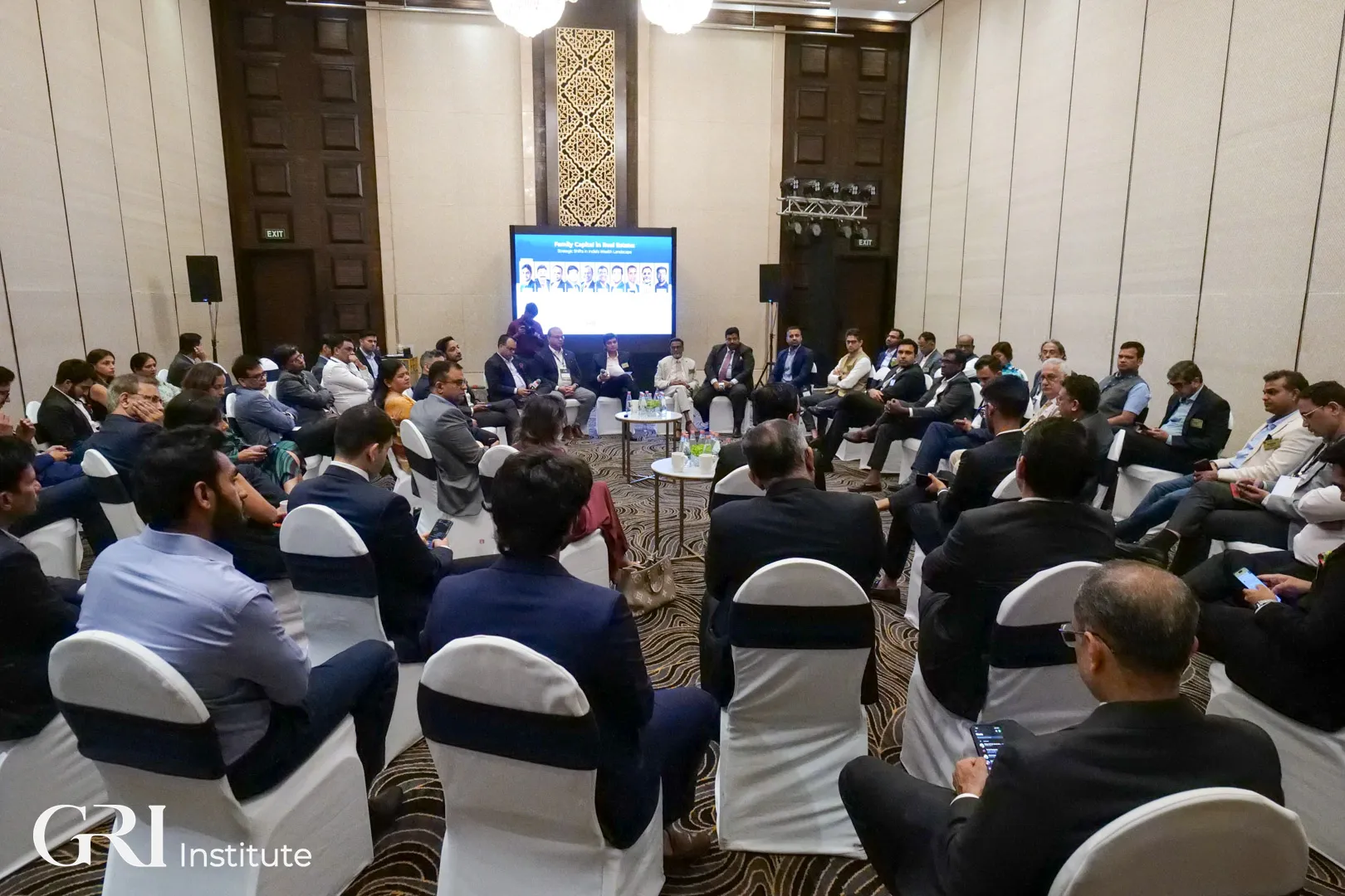 Attendees engaged during a panel session at the India GRI 2025 summit.