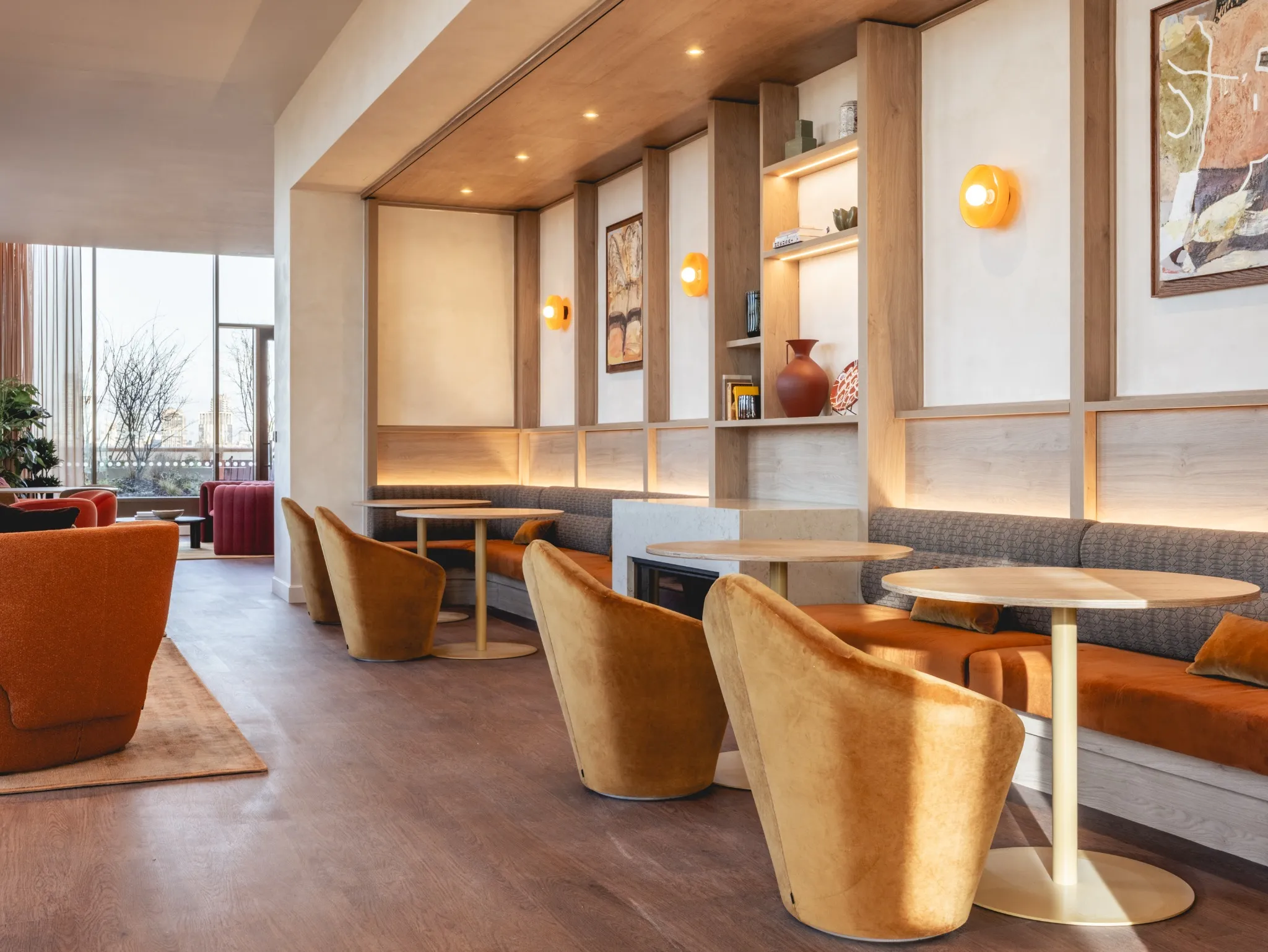 A luxurious guest room in the Orient Express La Minerva, featuring a plush bed with rich textiles and classic decor.