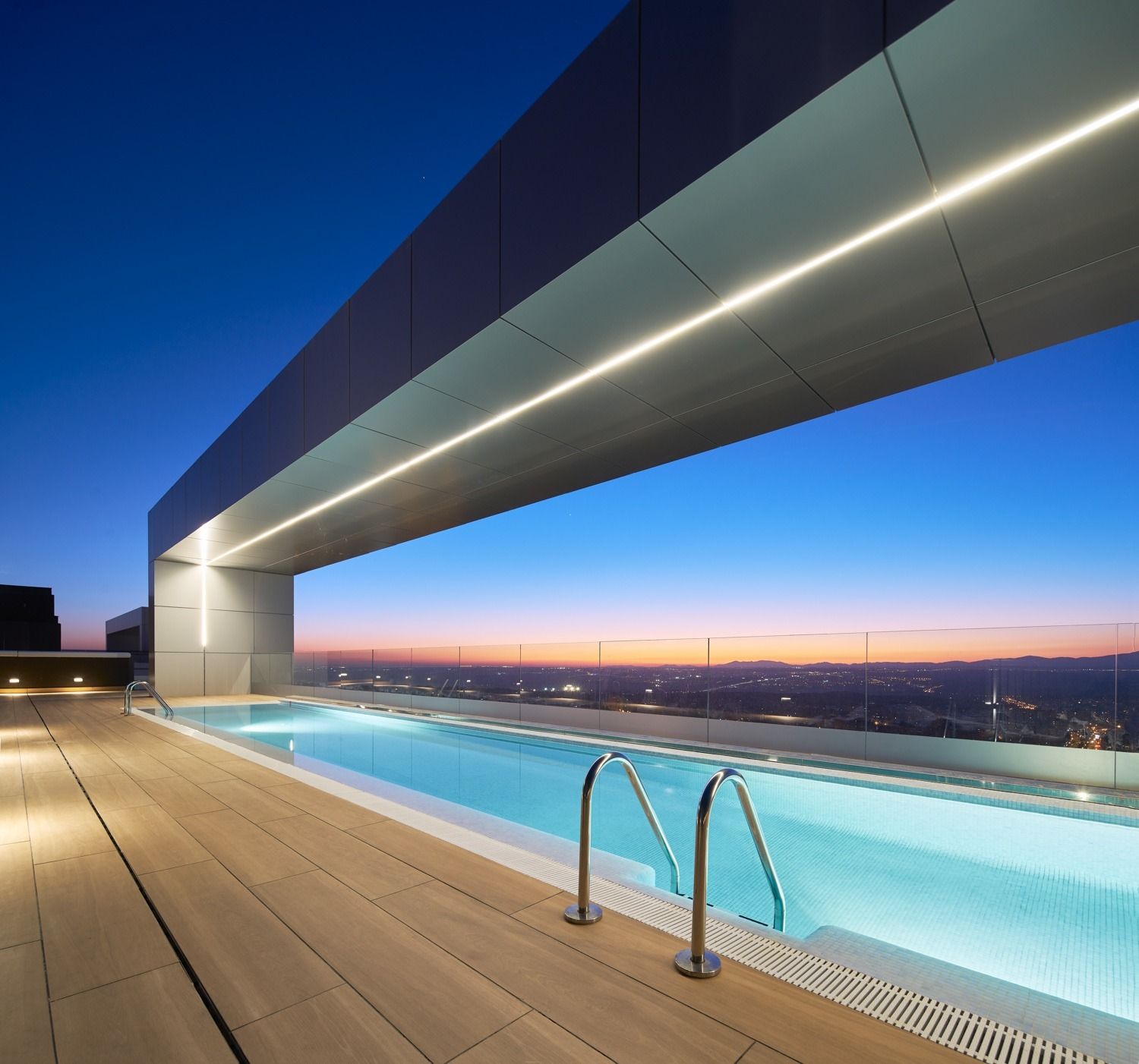 A luxurious guest room in the Orient Express La Minerva, featuring a plush bed with rich textiles and classic decor.